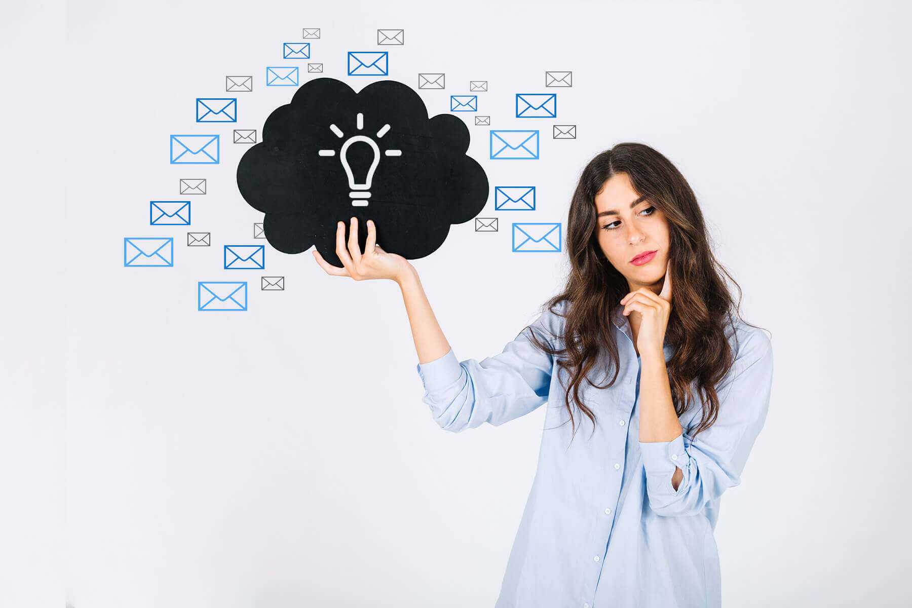 A girl holds a cloud with newsletter ideas.