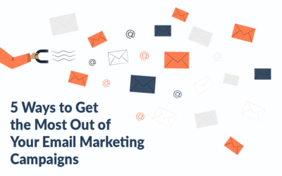 A graphic design with a hand holding a U shape magnet attracts the scattered envelopes and @ signs. This image graphically represents the benefits of email marketing campaigns.